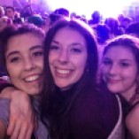 Emma, Morgan also known as "Mo" and Mikaela smile for a selfie together at a concert. Emma says "Don't let what you are going through hold you back from experiencing life."